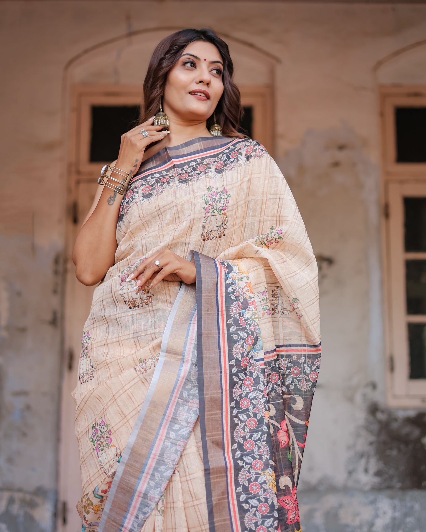 Designer Beige Saree with Contrast Black Pallu & Exquisite Ethnic Patterns